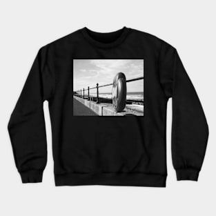 Life saver ring on the promenade at Cromer beach, Norfolk Crewneck Sweatshirt